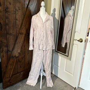 Victoria secrets pink stripped PJs long sleeves with tote.  Size Medium